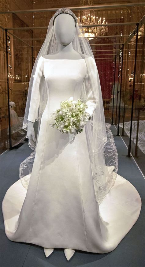 Meghan markle, duchess of sussex from the best royal wedding dresses meghan markle wed prince harry in a givenchy dress by the fashion house's creative director clare waight keller. Meghan Markle's Wedding Dress Goes on Display — and There ...