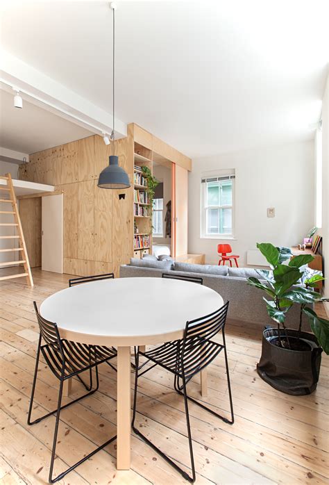 Small Inner City Apartment Uses Plywood To Enhance Perception Of Space