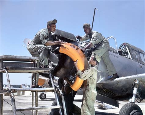 Mechanics At Tuskegee Army Air Field Alabama Maintain An Engine Of A