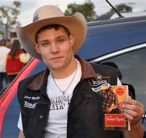 This Is Professional Bull Rider Jory Markiss Holding My Book You May