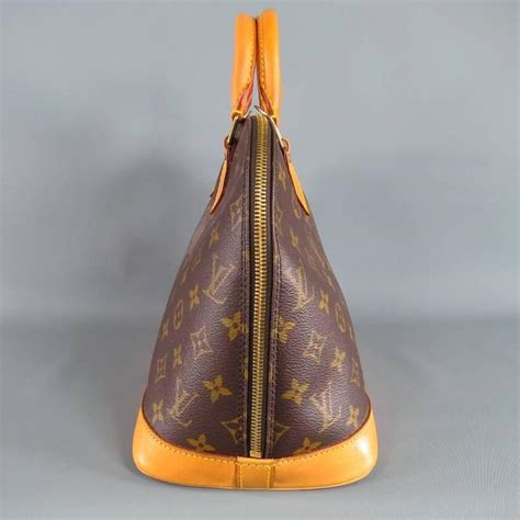 Louis Vuitton Brown Monogram Canvas Vintage Alma Pm Top Handles Bag At