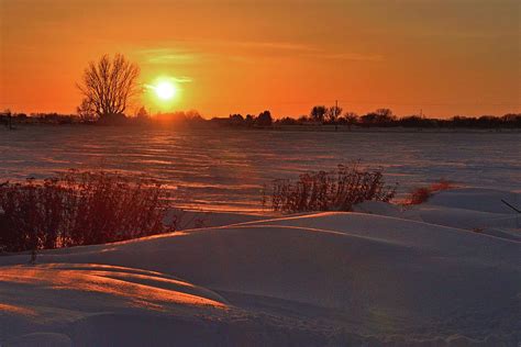 Snowy Sunset Photograph By Brian Wartchow Pixels