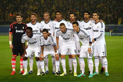 The Real Madrid Team Is Posing For A Group Photo Before Their Match