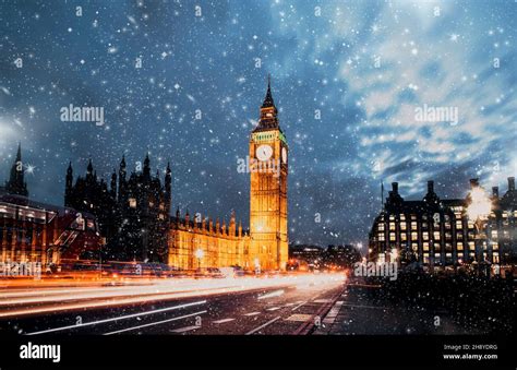 Snowfall Over Big Ben Winter In London Stock Photo Alamy