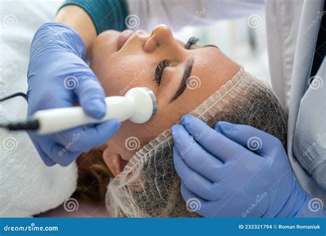 Young Woman Receiving Professional Procedure Facial Skin Ultrasound