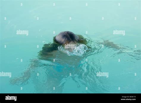 Woman Emerging From Water Stock Photo Alamy