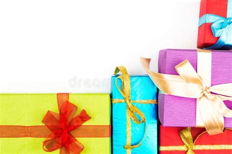 Big Pile Of Colorful Wrapped T Boxes Isolated On White Background