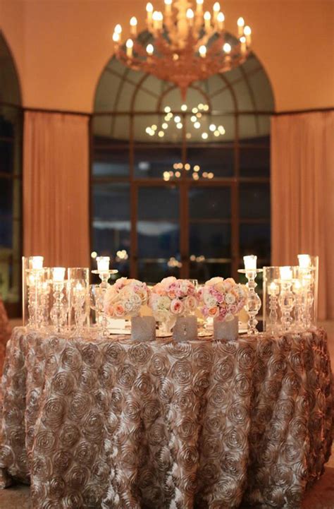 Beautiful lighting décor behind a lovely sweetheart table. Wedding Sweetheart Table Ideas Archives - Weddings Romantique