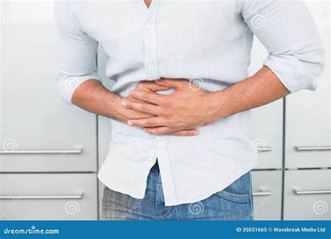 Mid Section Of Man Suffering From Stomach Pain Stock Image Image Of