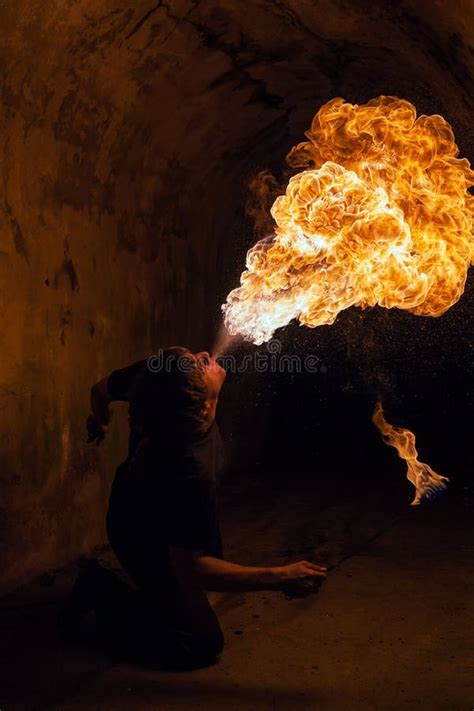 Young Man Blowing Fire From His Mouth Stock Image Image Of Fireeater