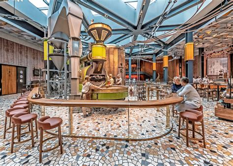 Milano is an inspiring international economic and financial hub. Starbucks Milano mette al centro le persone | Abitare
