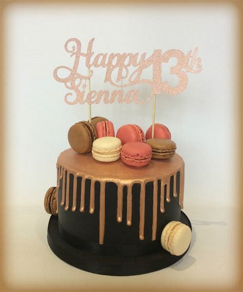 13th Birthday Rose Gold And Black Drip Cake Topped With Macarons