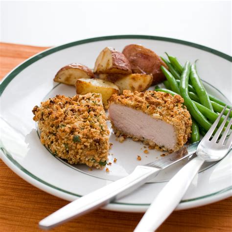 Place the pork chops on a wire rack set on a baking sheet and top evenly with any breadcrumbs remaining in the bag. Crunchy Baked Pork Chops Recipe - Cook's Illustrated