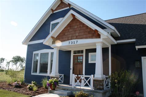 Cool Hardie Board Siding In Blue Matched With White Trim Board Window