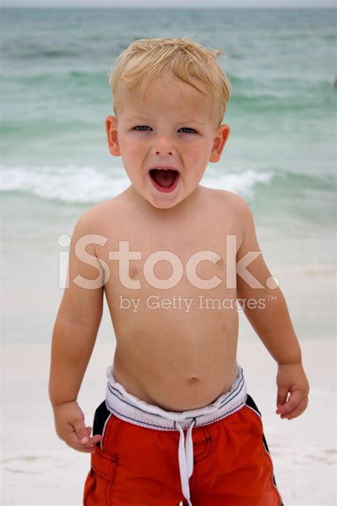 Happy Boy At The Beach And Ocean Stock Photo Royalty Free Freeimages