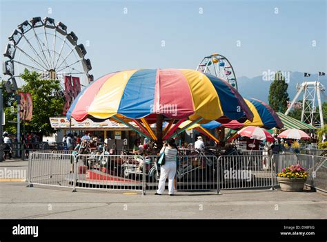 rides at an amusement park at pacific national exhibition vancouver british columbia canada