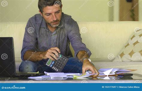 Young Attractive And Busy Man At Living Room Sofa Couch Accounting