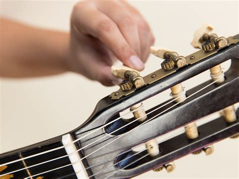 How To Change Strings On An Acoustic Guitar With Pictures Wiki How