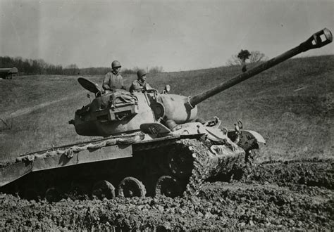 American M26 Heavy Tank Rolls Across A Muddy Field 1945 The Digital