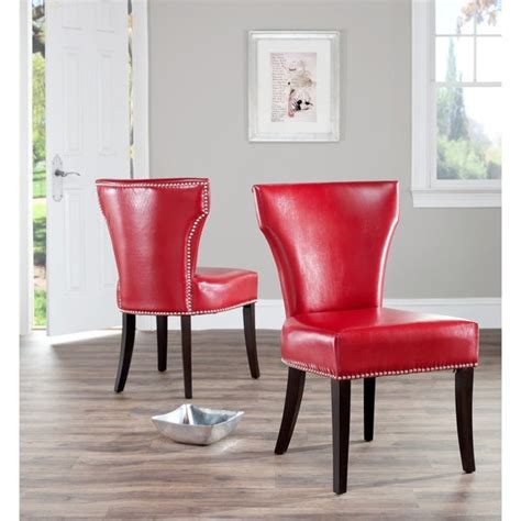 Stylish and elegant, our chairs look great with any dining table. Shop Safavieh En Vogue Dining Matty Red Leather Nailhead ...