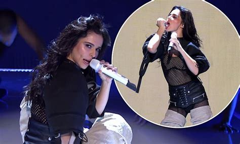 Cheryl Baffles Fans As She Licks Her Hand During Performance Again