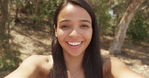 Cute Mexican Girl Taking Selfie Stock Footage Video 100