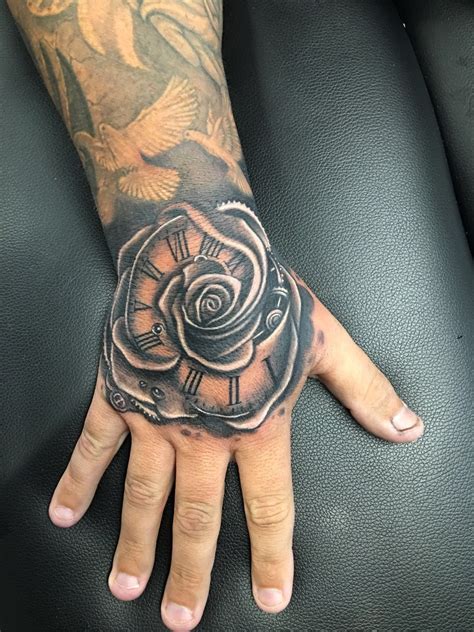 Rose Hand Tattoo By Greg At Holy Trinity Tattoos Hand Tattoos For