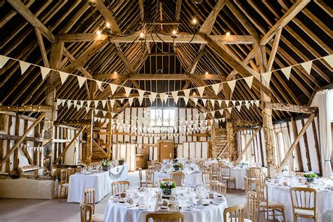 The wedding ceremony is held on a beautiful little point that you reach by walking over our 60 foot wood bridge. Clock Barn Gallery | Rustic wedding venue Hampshire