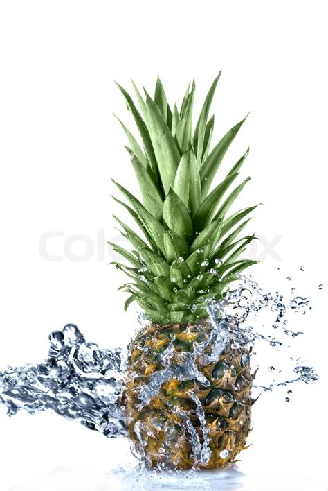 Pineapple With Water Splash Isolated On White Stock Image Colourbox