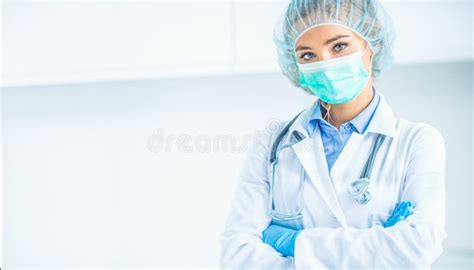 Portrait Of Doctor Woman Surgeon Specialist In Sterile Clothing Stock