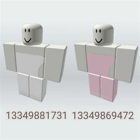 Two White And Pink Blocks With Faces On Them One In The Shape Of A Man
