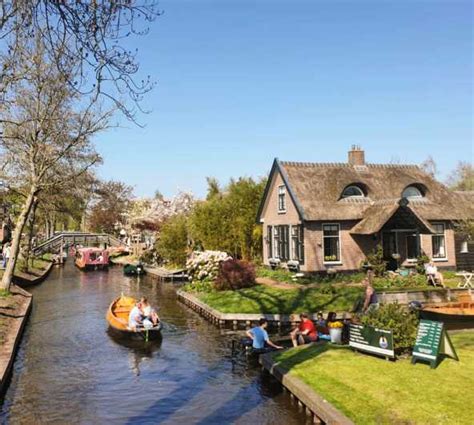 From Amsterdam Giethoorn Day Trip By Bus And Electric Boat Getyourguide