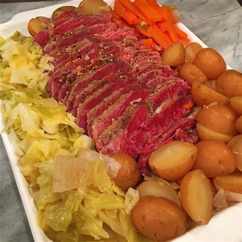 Add a juicy, savory touch to your grilled cheese sandwich with some corned beef. Slow Cooker Corn Beef and Cabbage | Norine's Nest
