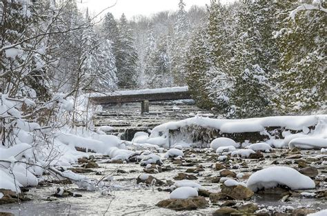 A Winter Wonderland View Of The Autrain River Fresh Snow Falling And