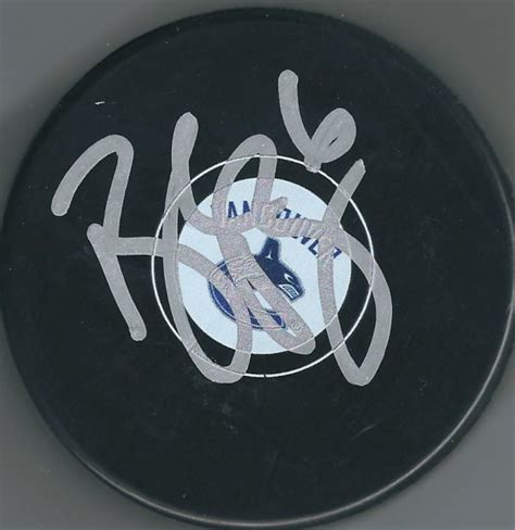 autographed brock boeser vancouver canucks hockey puck main line autographs
