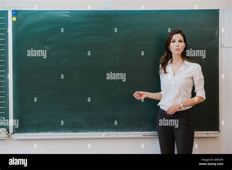 Woman Pointing Finger At Blank Board School Teacher Pointing The