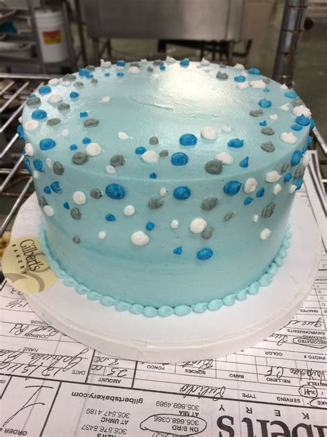 Smooth Finished Blue Buttercream Cake With Dots In Blue White And