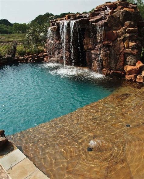 Swimming Pool With Waterfalls Ideas 25 Inspiring Designs