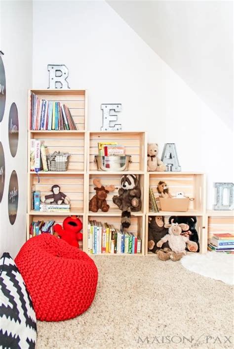 Four crates, three pieces of wood, a handful of nails, a tube of liquid nails and vintage wheel casters: 12 Ideas How To Make DIY Crate Bookshelf - DIY Ideas