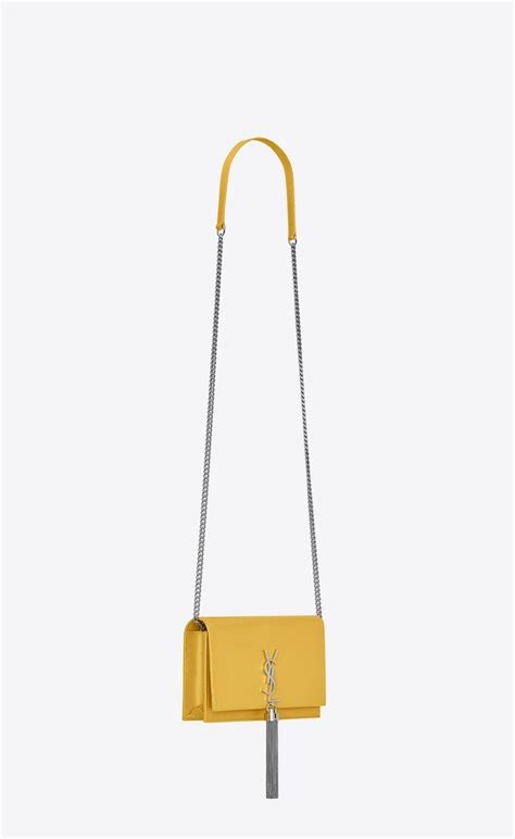 Kate chain wallet with tassel in grain de poudre embossed leather, Another angle view | Embossed ...