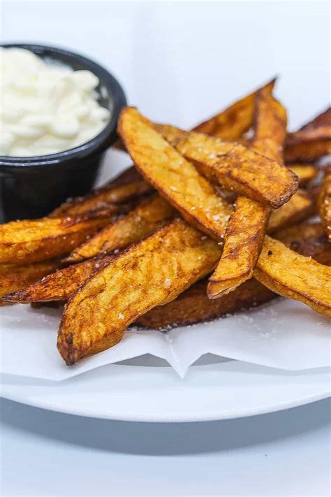 Yes, they look like any other homemade chip, but there's something special about them; Perfect Belgian Fries Cooked in Duck Fat