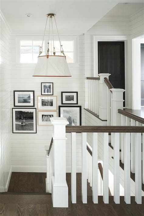 Cottage Shiplap Staircase With Black And White Photo Gallery Cottage Entrance Foyer