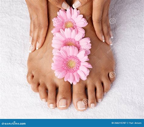 Flowers Beauty And Woman Hands With Feet Manicure And Pedicure Spa