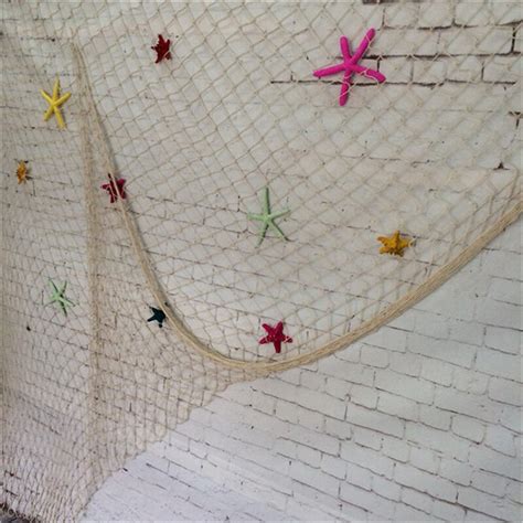 This fine mesh fabric is made of 100% polyester, and can be used to protect you from bugs and mosquitoes inside or out. Mediterranean Style Fishing Net Wall Decor - Oceans2u.com