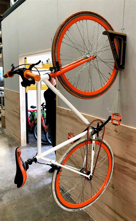 The solid wood adds a genuine sense of quality to your wardrobe. Vertical Bike Hanger - CEL-UK