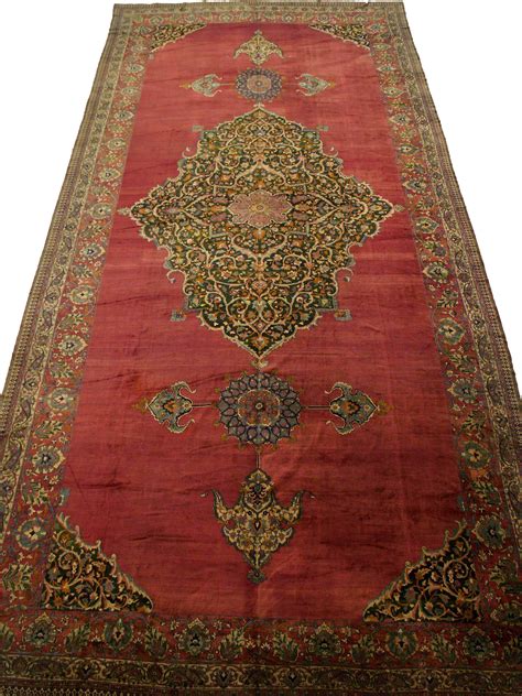 Or, keep it minimalist with a low pile. 19′ x 43′ Large Oversized Antique Palace Rug | Dilmaghani