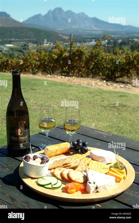 Bottle Of Wine And Cheese Platter At Dieu Donne Vineyards Franschhoek
