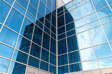 Premium Photo Glass Building With Mirrored Windows Skyscraper Line
