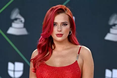 Bella Thorne Flashes Bum As She Poses In Nothing But Towel For Mirror