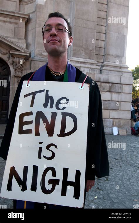Occupy London Man With Sandwich Boards Saying The End Is Nigh In Front Of St Pauls Stock
